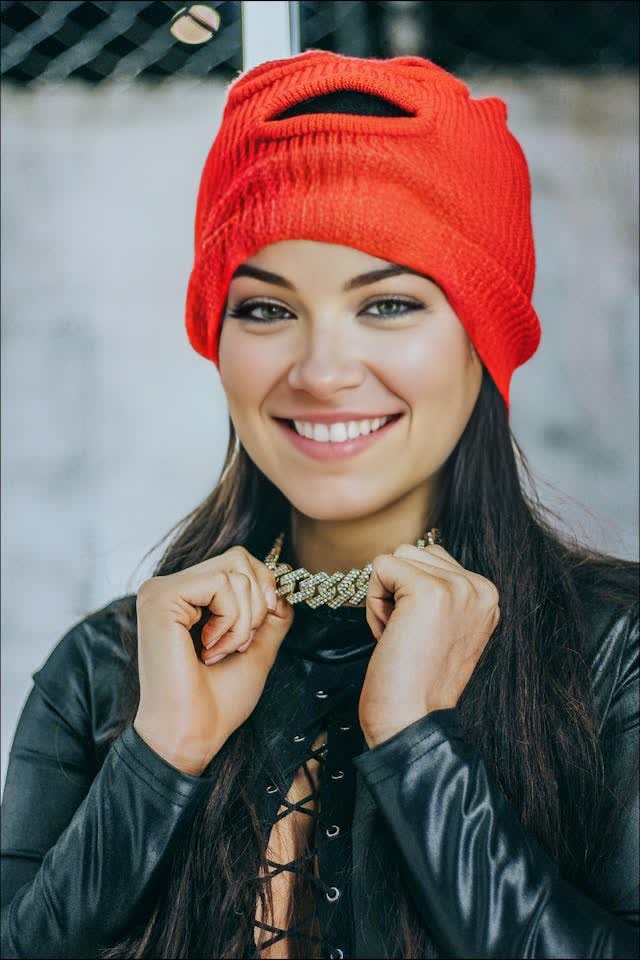 The same photo after AI face replacement, with a synthetic face and unchanged pose, hair, and lighting